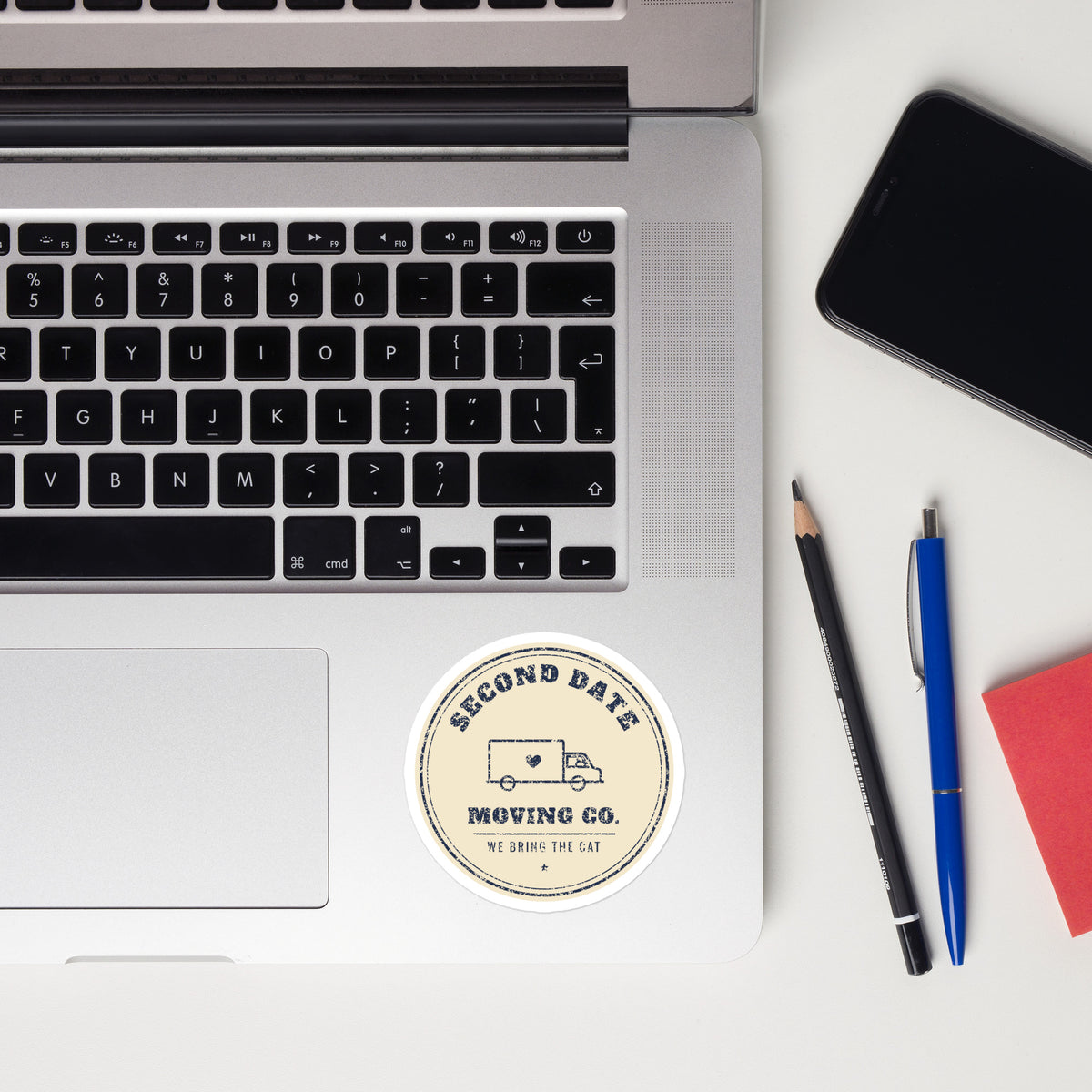 Second Date Moving Co. Sticker: We Bring the Cat on a laptop