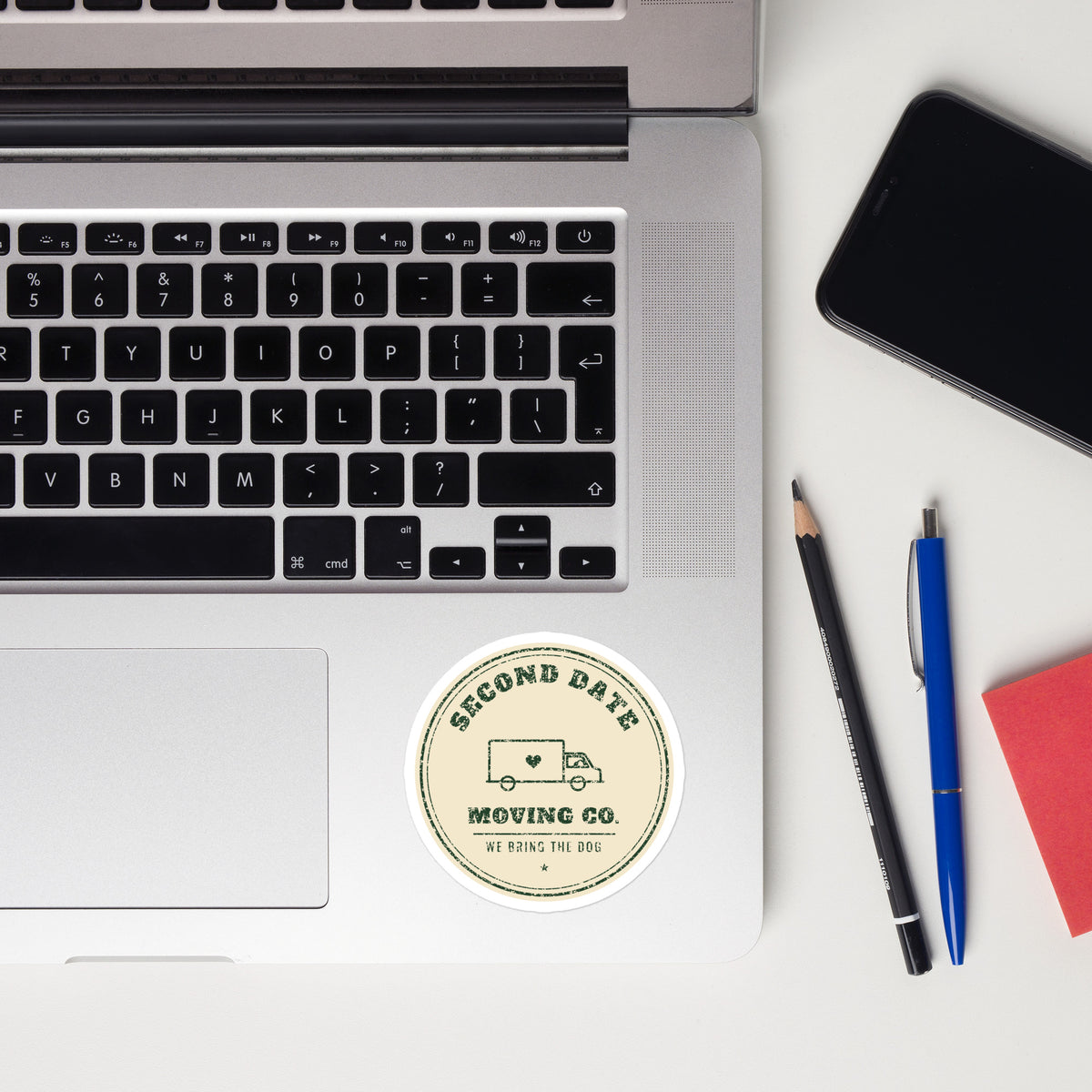Second Date Moving Co. Sticker: We Bring the Dog on a laptop